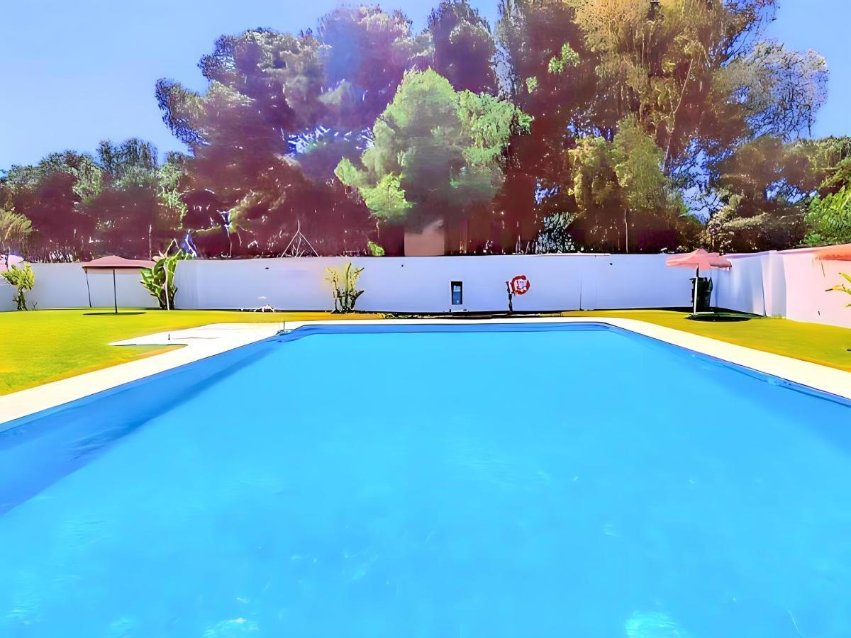 Apartamento Junto El Mar Con Piscina โกนิล เด ลาฟรอนเตรา ภายนอก รูปภาพ